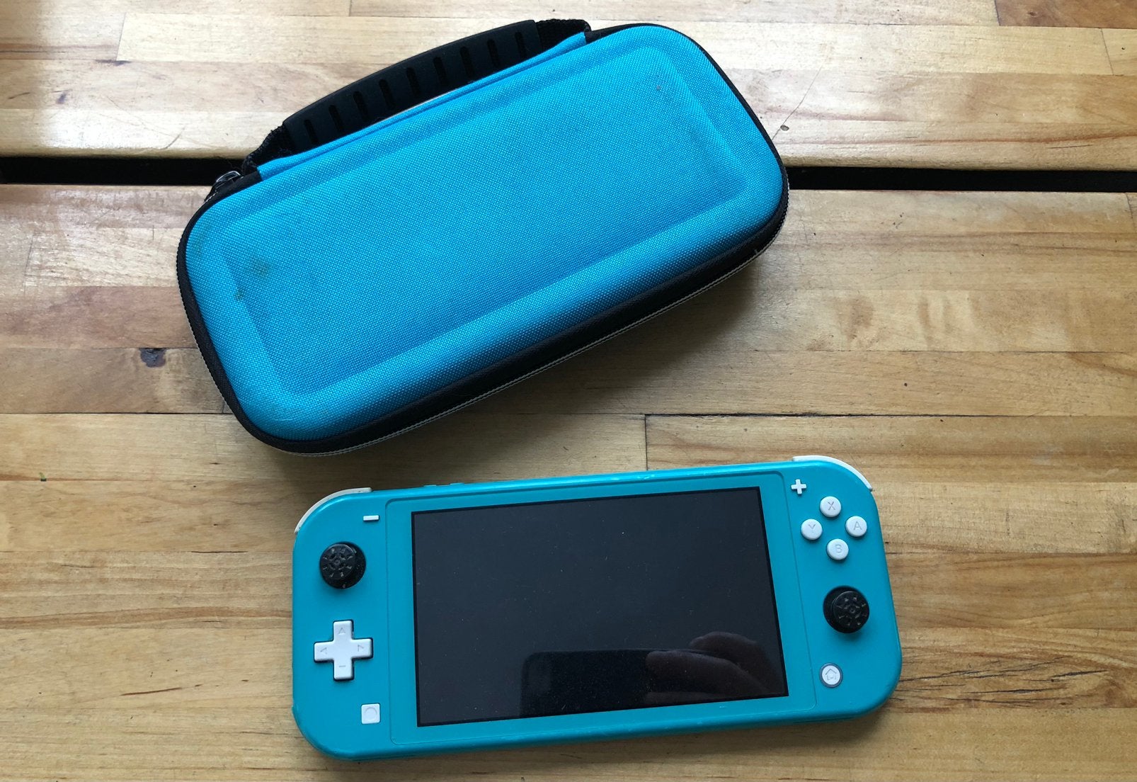 Nintendo Switch Lite + Beschermhoes(L-knop defect), Games en Spelcomputers, Spelcomputers | Nintendo Switch Lite, Gebruikt, Turquoise