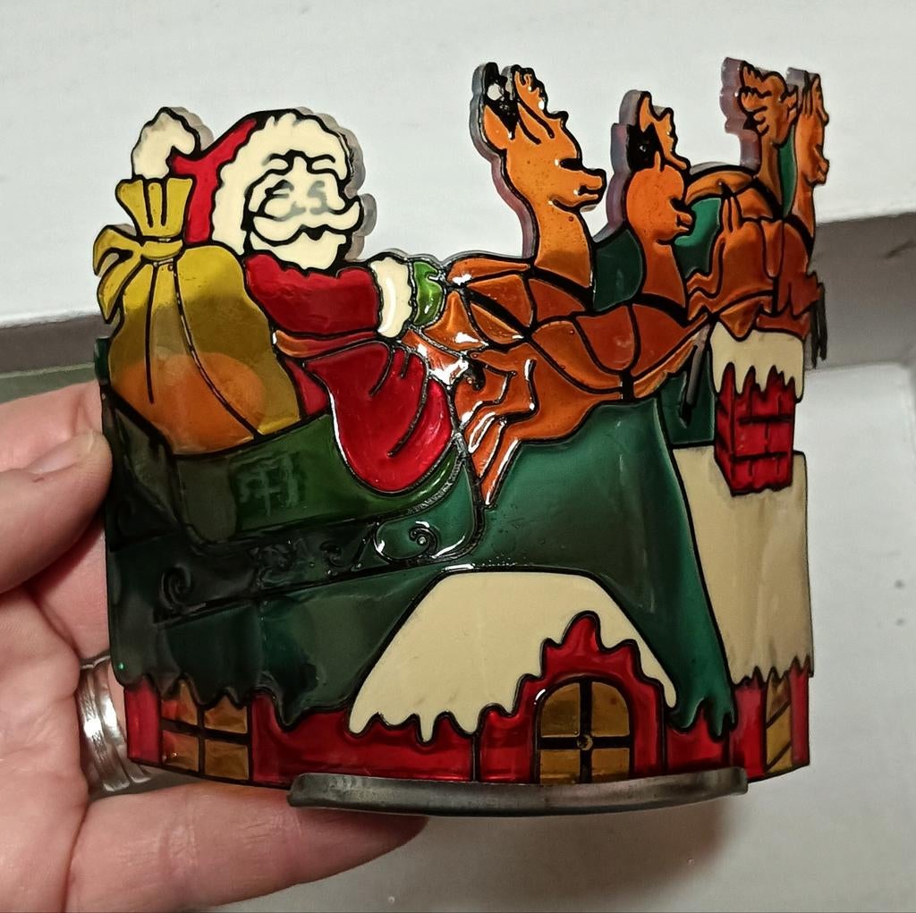 Kaarsenhouder voor de kerstman, Ophalen