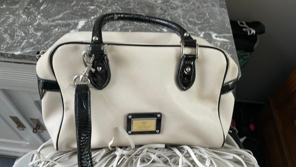 Sac guess, Enlèvement ou Envoi