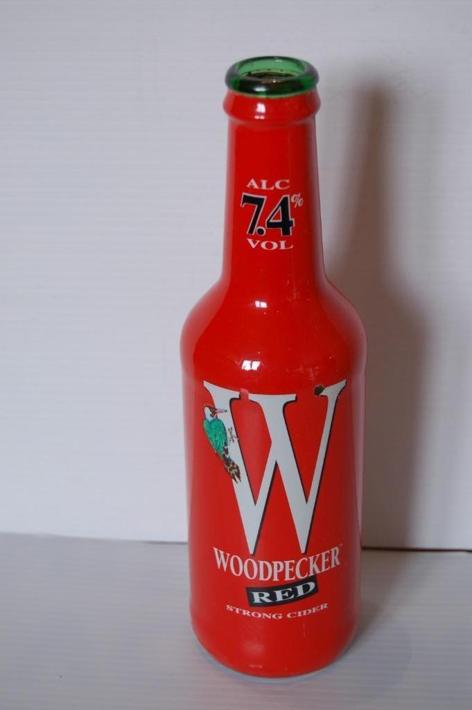 Woodpecker - flesje met sleeve - Red strong Cider, Verzamelen, Ophalen of Verzenden, Gebruikt, Flesje(s)