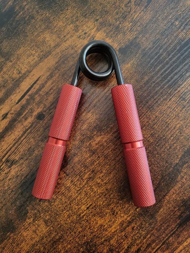 Hand gripper van XXL Nutrition *Nieuwstaat*, Sport en Fitness, Ophalen of Verzenden, Zo goed als nieuw