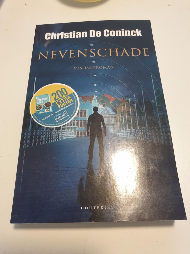 Coninck, Christian De - Nevenschade, Boeken, Thrillers, Zo goed als nieuw, België, Ophalen of Verzenden