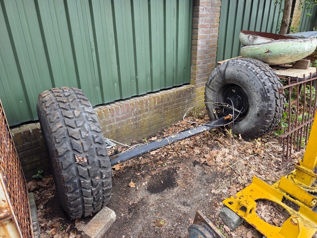 Geremde landbouw as met wielen, Ophalen