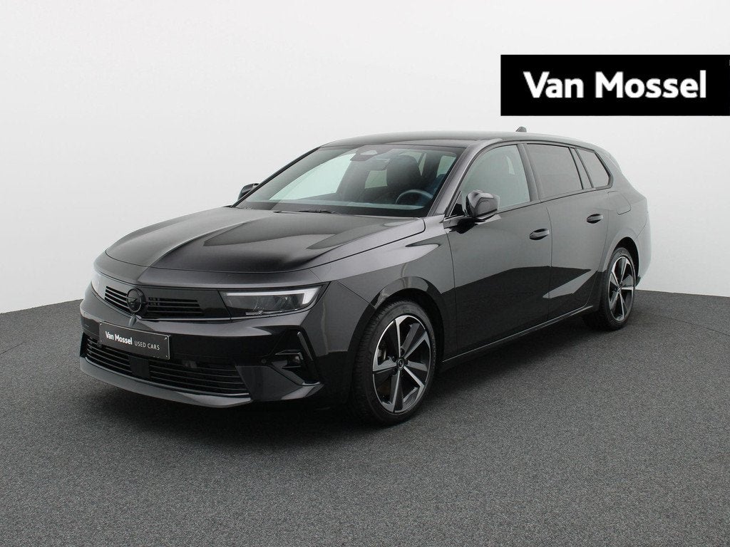 Opel Astra Sports Tourer 1.6 Turbo Hybrid 132kW GS STUUR- EN, Auto's, Apple Carplay, Stof, 4 cilinders, Zwart