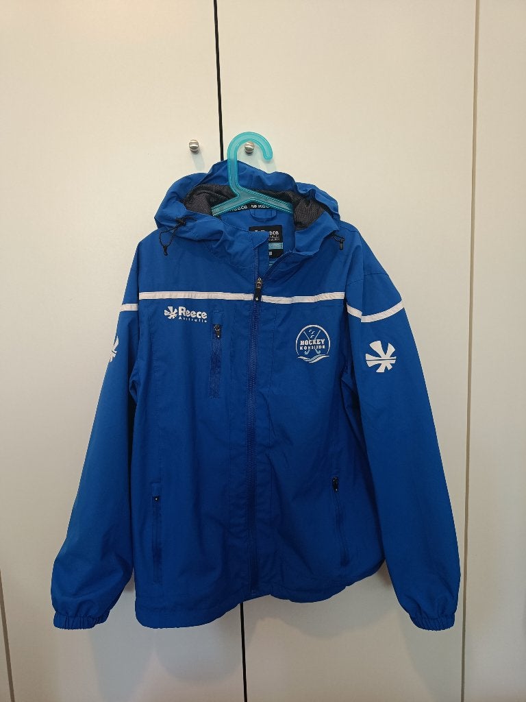 Hockey Club Koksijde - Regenjas 164, Sport en Fitness, Hockey, Ophalen of Verzenden, Zo goed als nieuw, Kleding