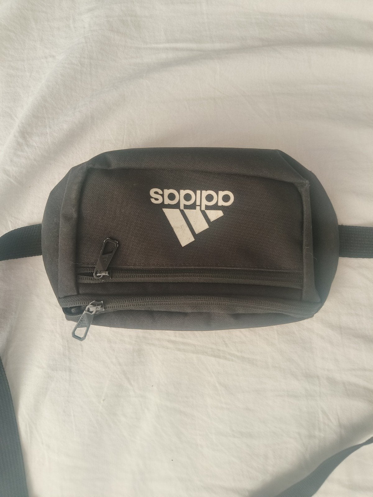 heuptasje adidas, Ophalen