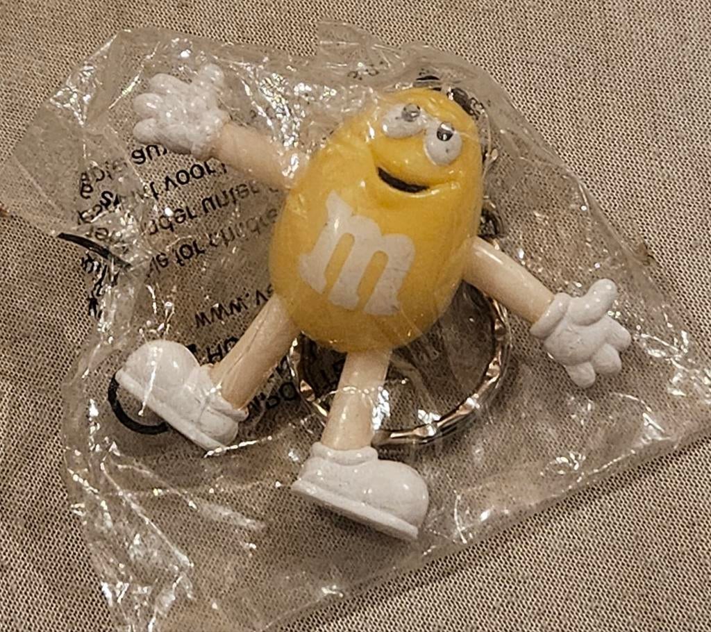 Porte-clés jaune M&M NOUVEAU
Cet objet de collection, Enlèvement ou Envoi