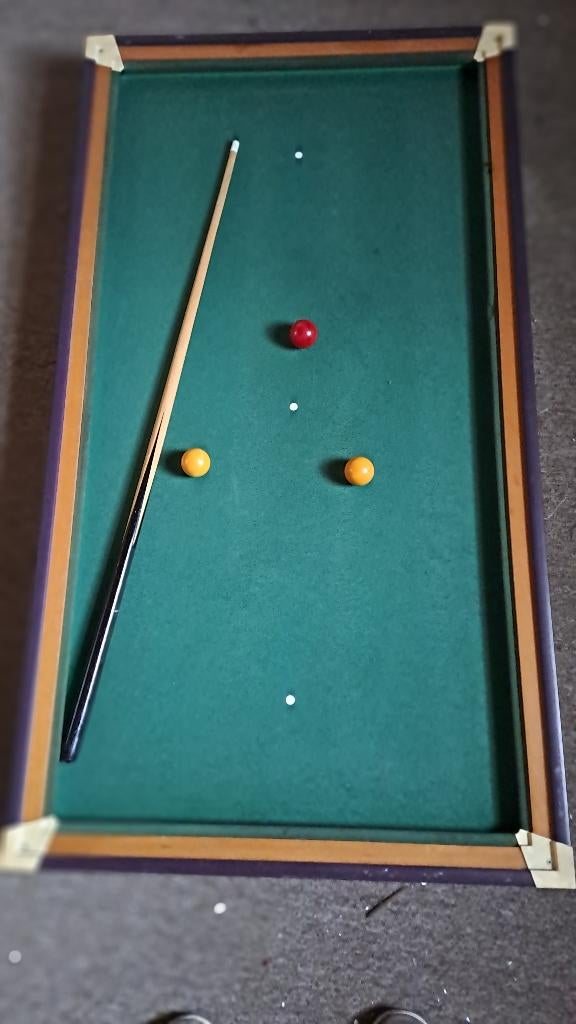 Mini biljard, Ophalen, Biljarttafel