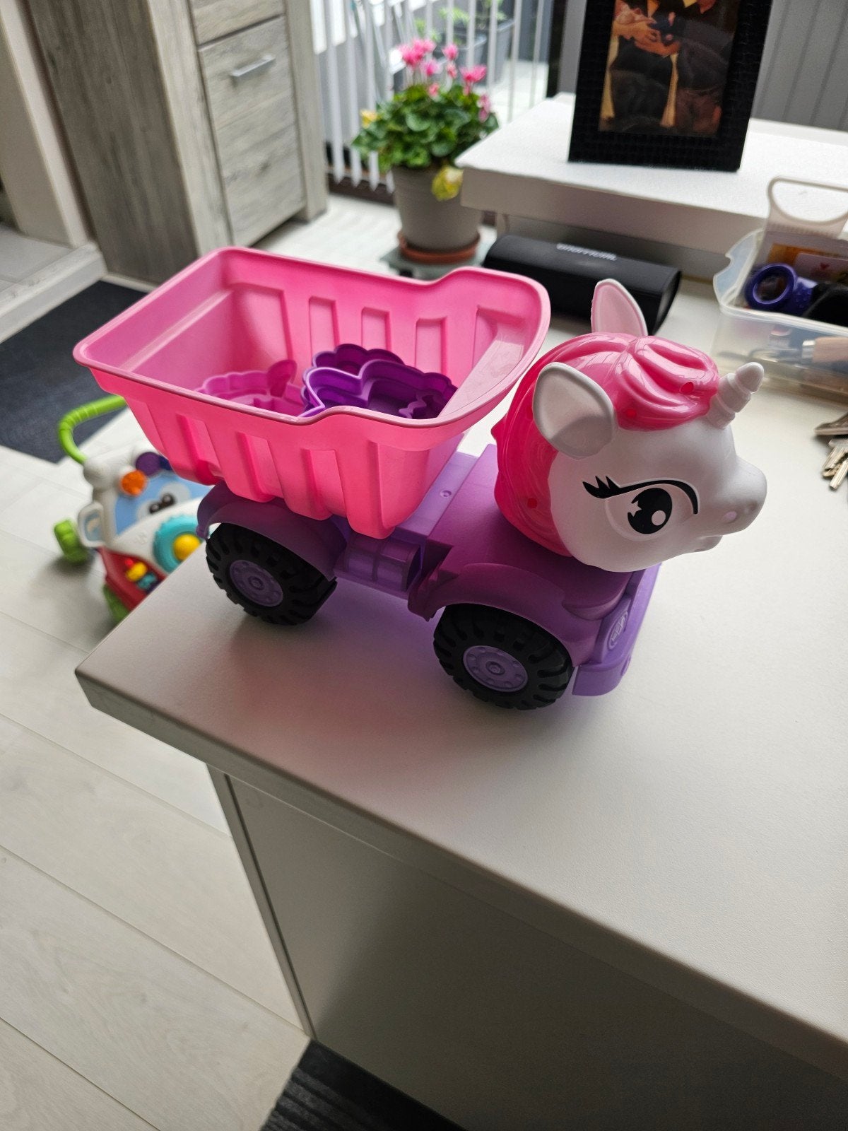Vrachtwagen met vormjes, Ophalen
