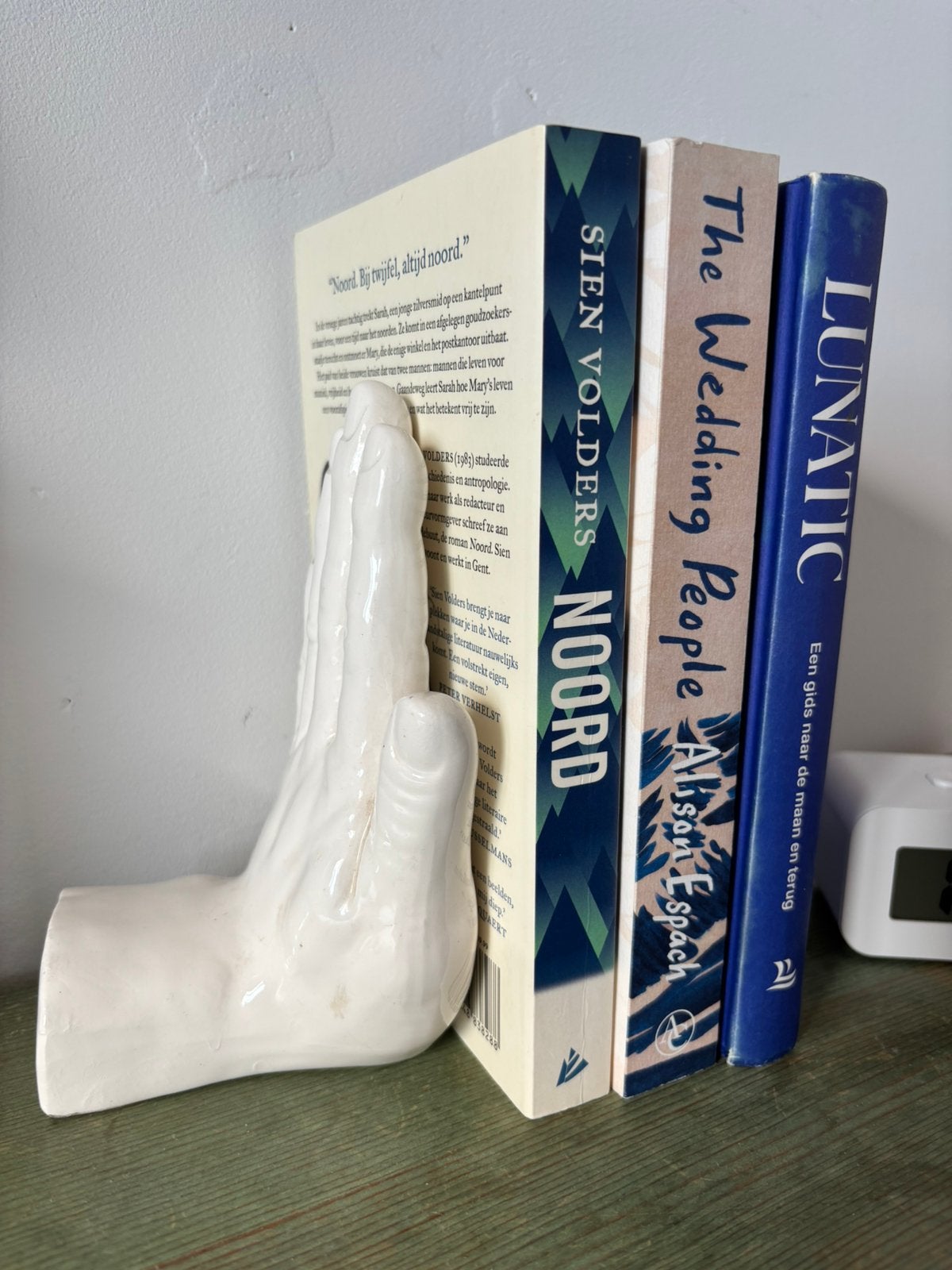 Keramische boekensteun hand / handvormig beeldje, Ophalen