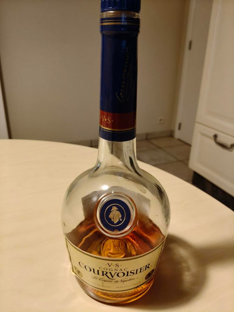 Rest fles cognac te ruilen voor 4 blikken cola, Ophalen
