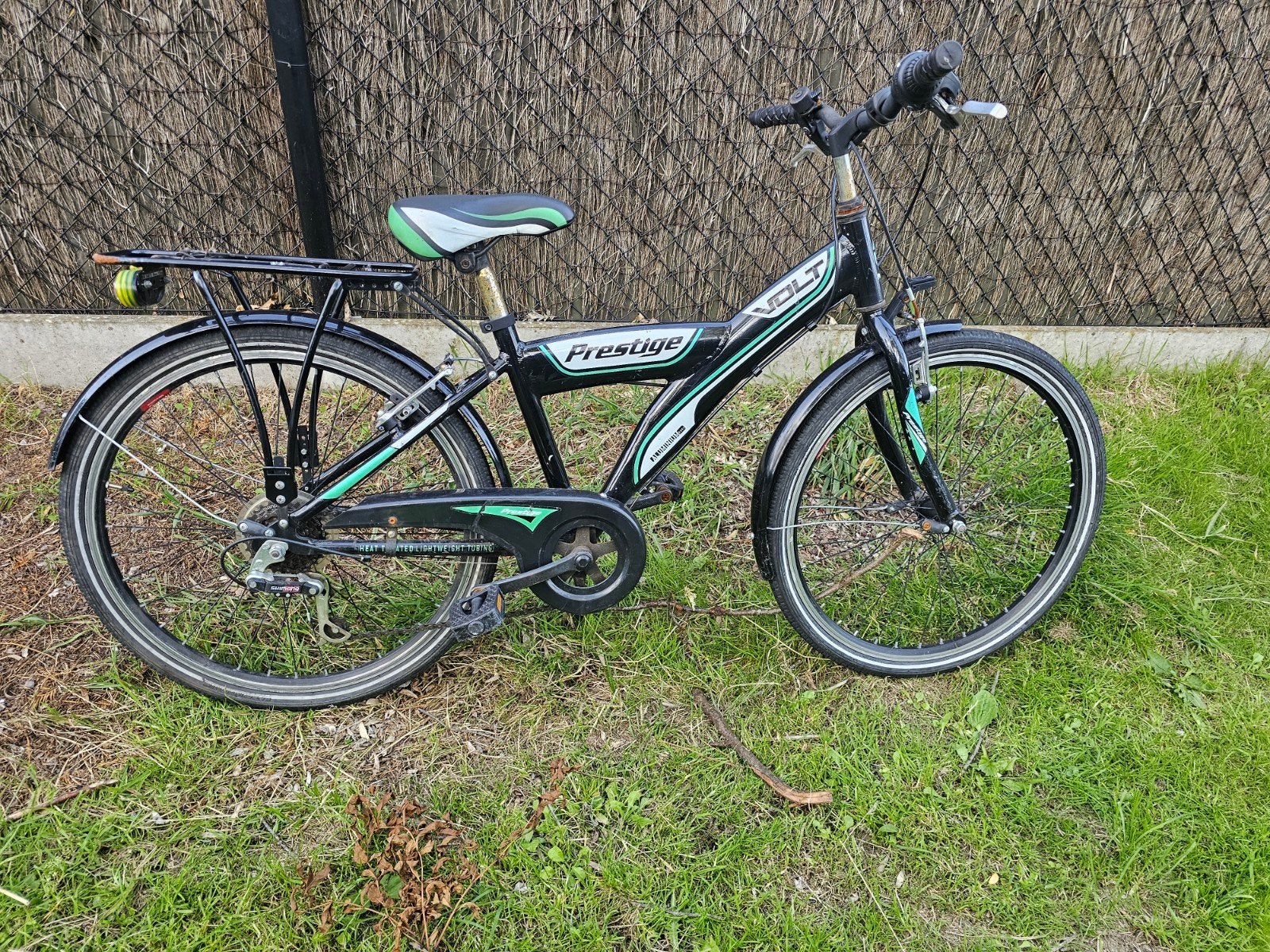 jongens kinderfietsje, Ophalen