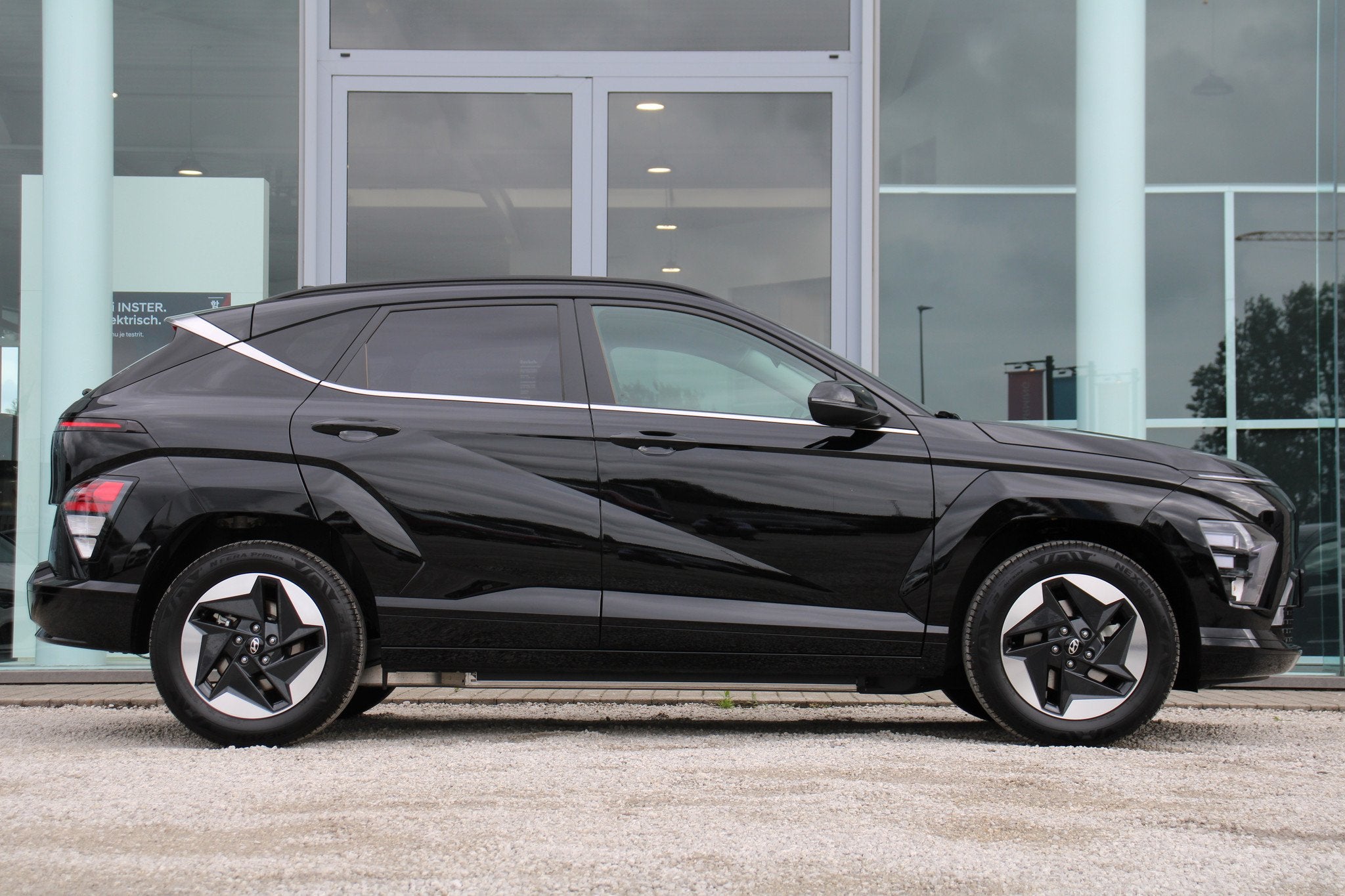 Hyundai KONA EV Feel Comfort 48KWh *52M GARANTIE*ZETEL+STUUR, Autos, Achat, Entreprise, Carnet d'entretien, Noir