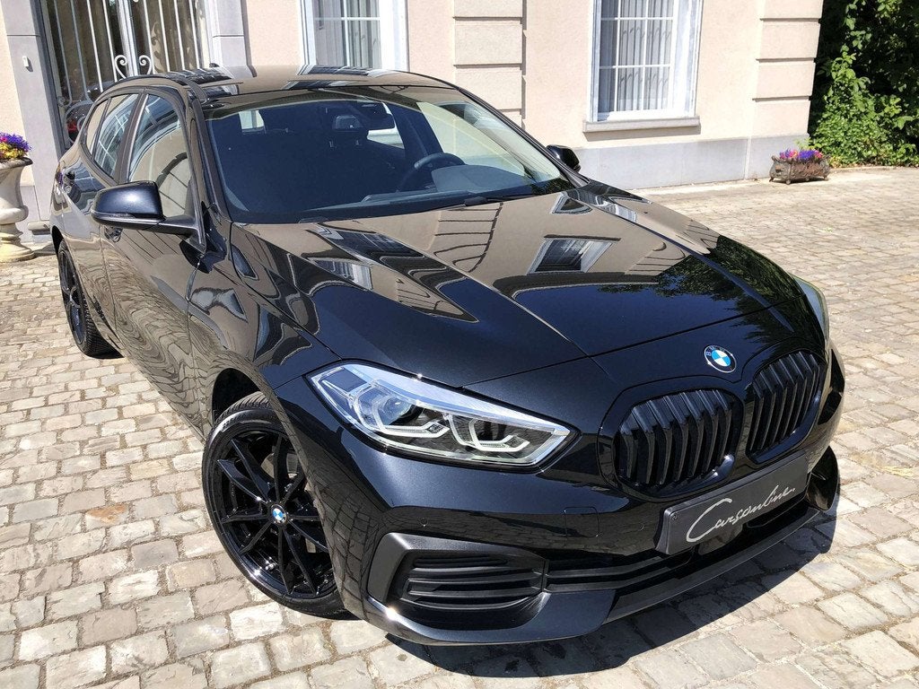 BMW 1 Serie 116 iA Zetelverwarming, Camera, Carplay, Garanti, Auto's, BMW, Automaat, Lichtsensor, Gebruikt, Overige kleuren