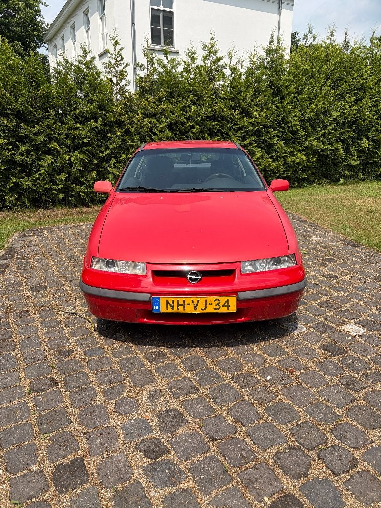 Opel Calibra 2L rood 1995, Auto's, Stof, Calibra, 4 cilinders, Elektrische ramen