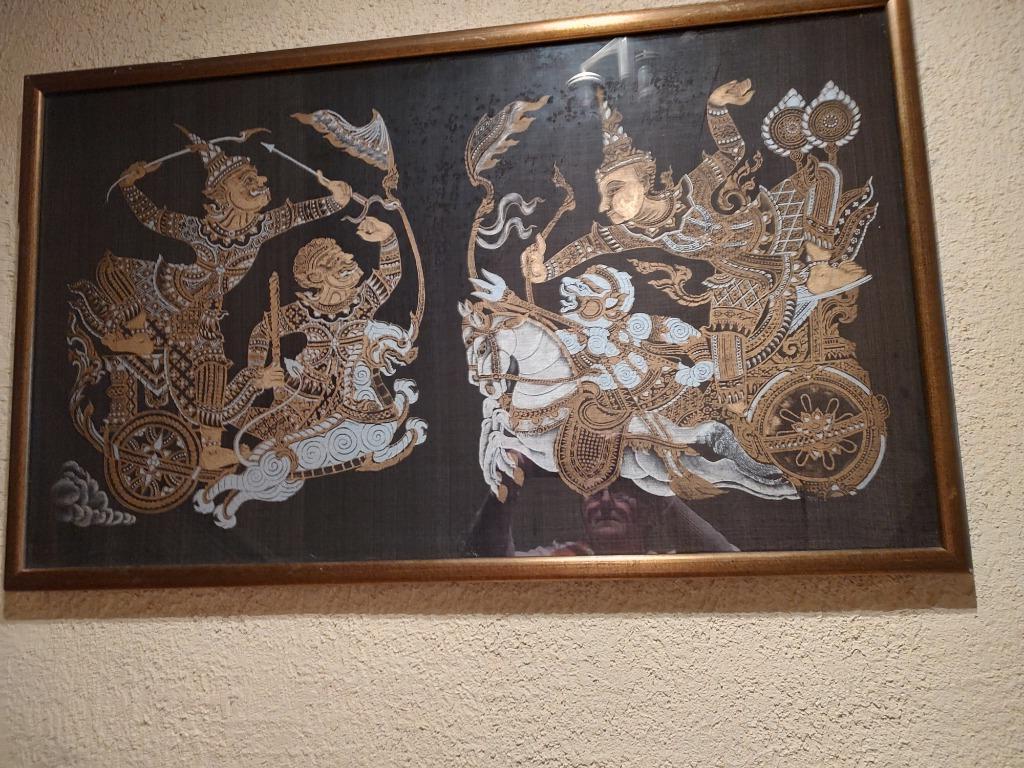 Grote kader met Thaise doek, Ophalen
