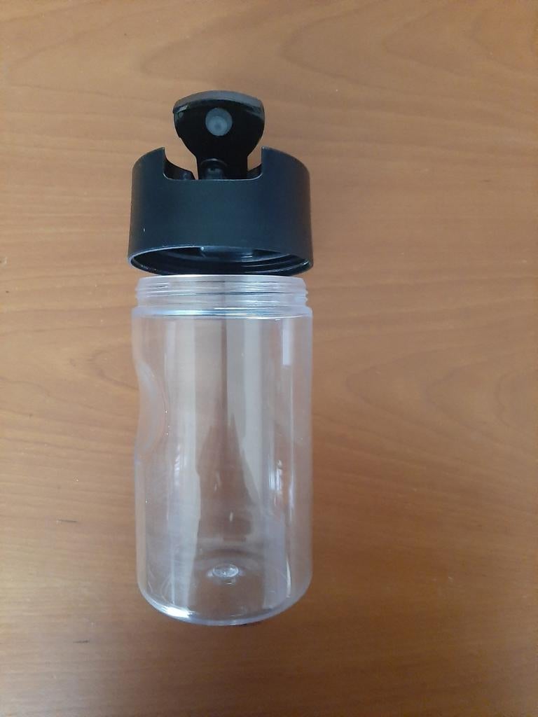Oliefles 800ml. Tupperware. Nieuw., Huis en Inrichting, Keuken | Tupperware, Ophalen of Verzenden, Nieuw