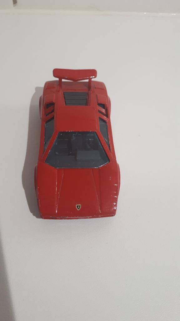 Bburago Lamborghini Countach 5000 Rouge, Enlèvement ou Envoi, Comme neuf, Voiture