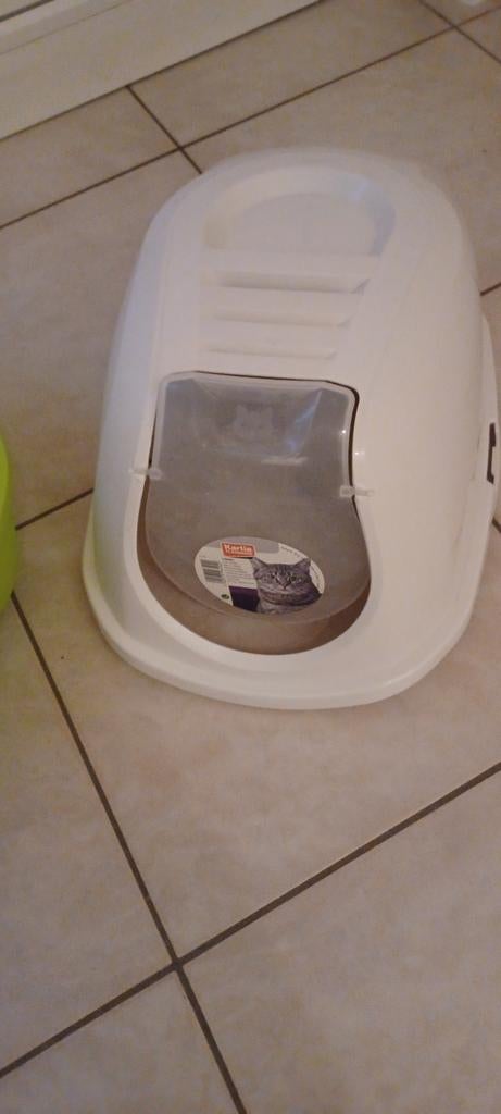 Kattenbak met deksel, Ophalen