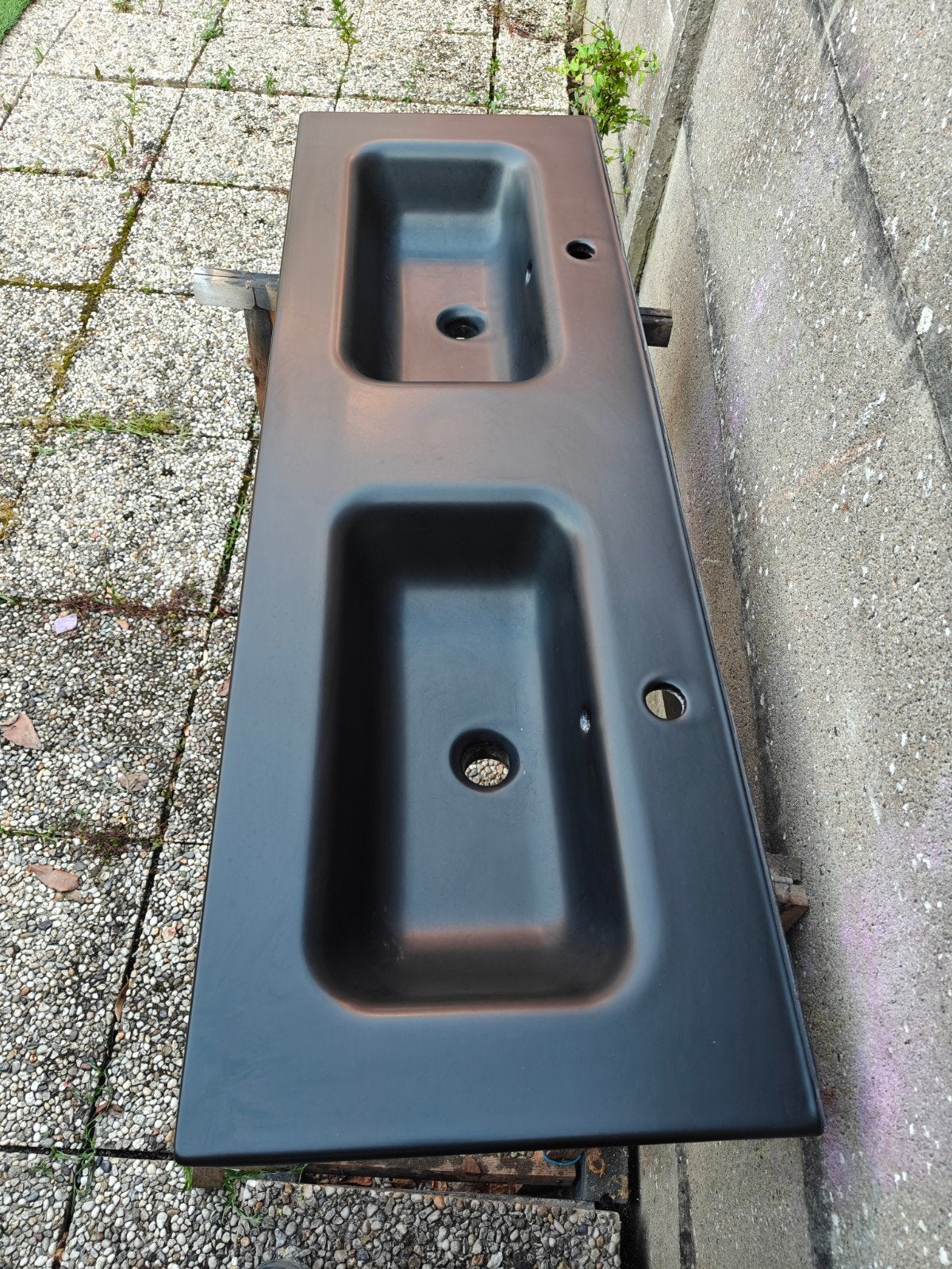 Dubbele wastafel, Ophalen