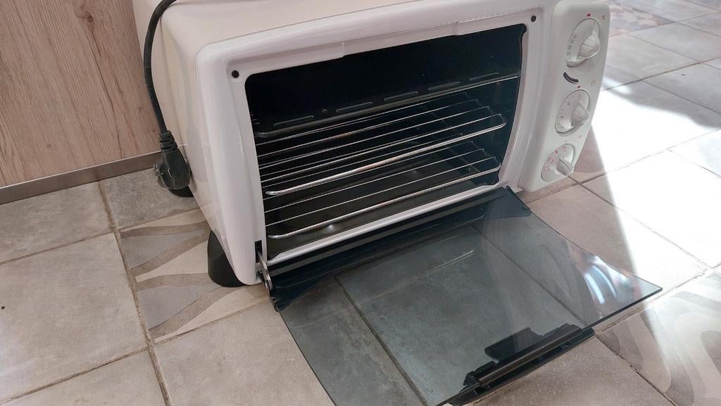 Kleine oven Delonghi (nieuw), Ophalen