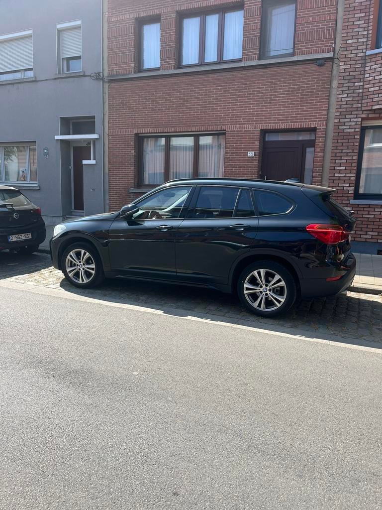 BMW X1 met leder en Xenon sportpakket, Auto's, BMW, X1, Lichtsensor, 1600 cc, Zwart