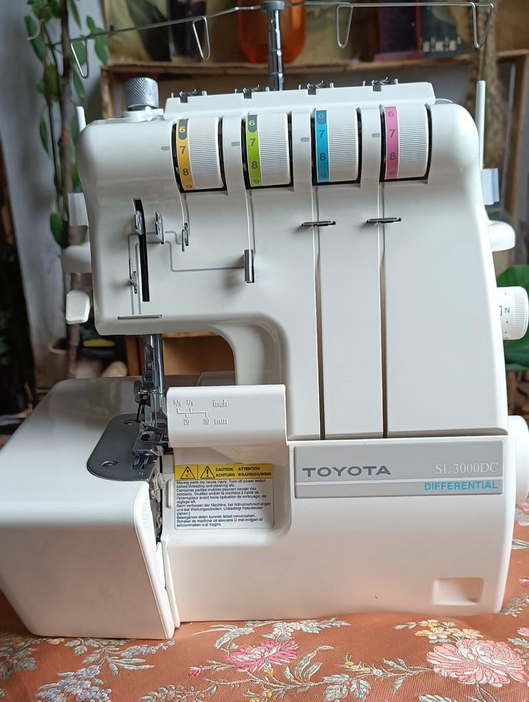 Overlock machine Toyota, Ophalen