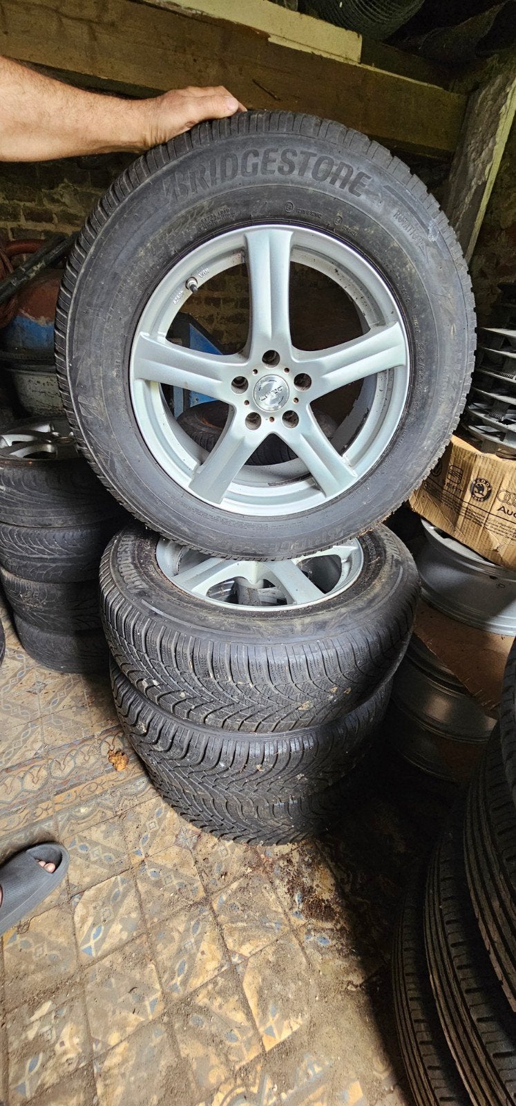 4 pneus sur jantes Bridgestone Blizzak LM005 235/65 R 17 108, Ophalen, All Season, Band(en)