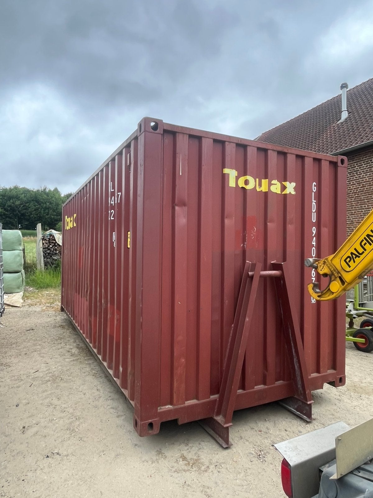Zeecontainer op slede, Ophalen
