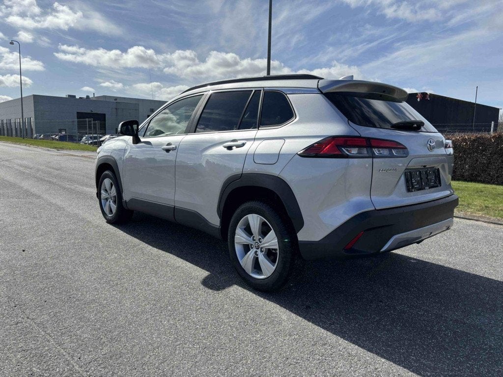 Toyota Corolla Cross 1.8 Hybrid Comfort | Achteruitrijcamera, Auto's, Stof, Gebruikt, 4 cilinders, 2 kWh
