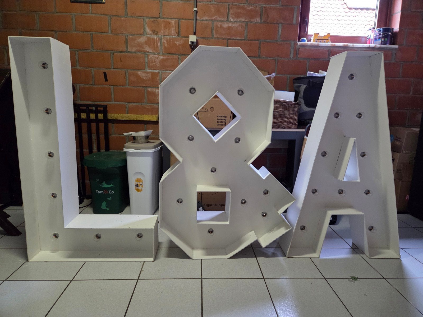 Lichtletters L&A., Ophalen