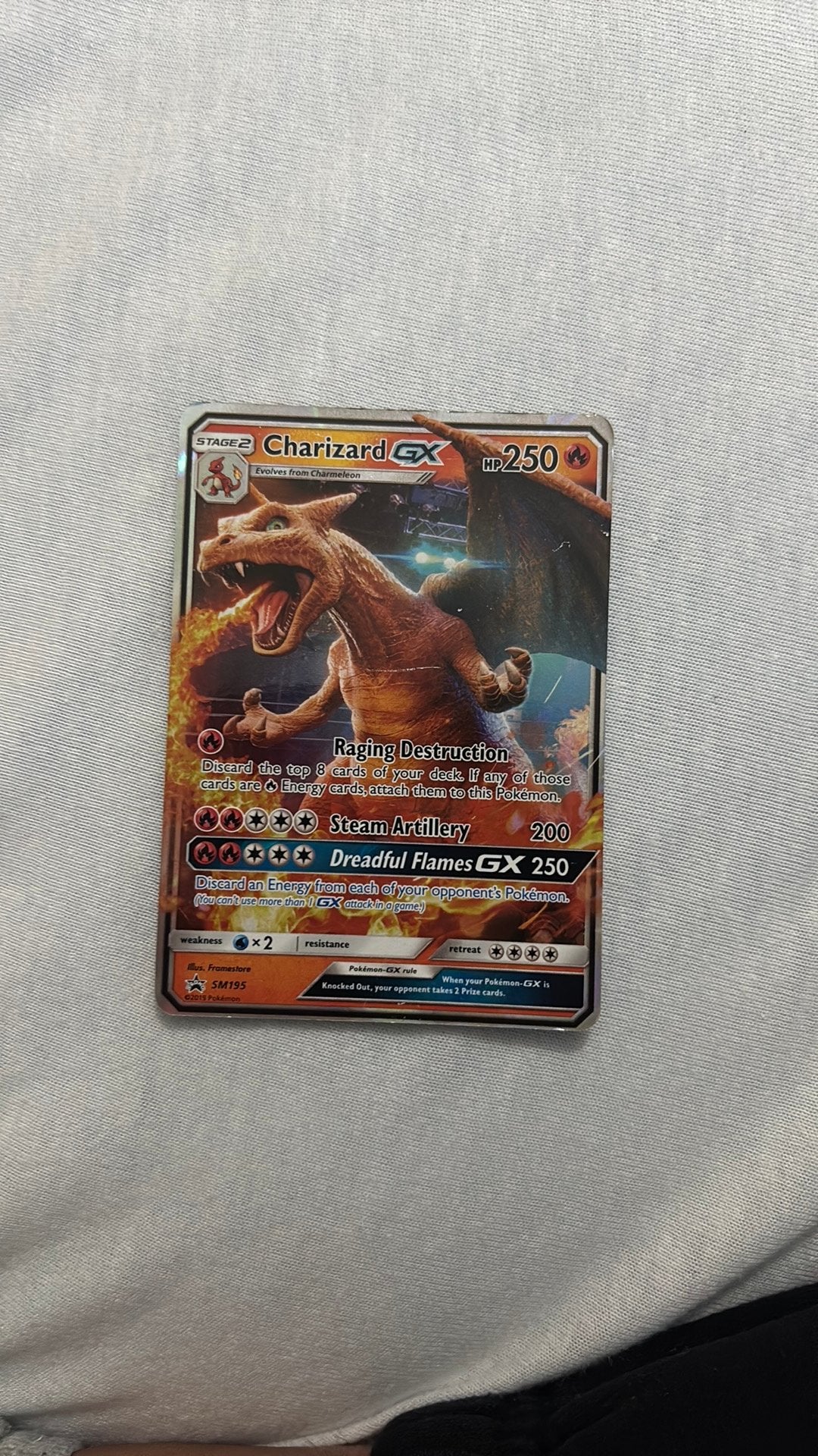 CHARİZARD GX SM195 MET HOESJE, Ophalen of Verzenden, Zo goed als nieuw