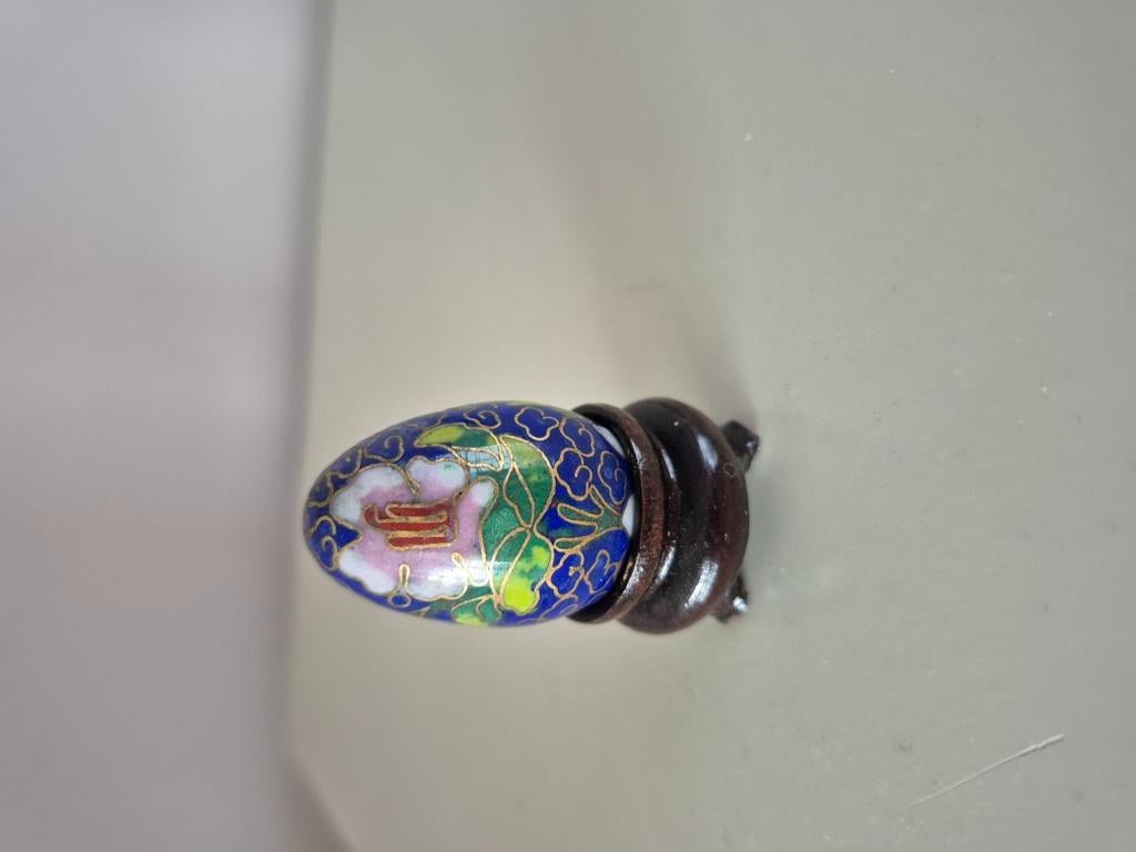 mini cloisonné ei, Ophalen