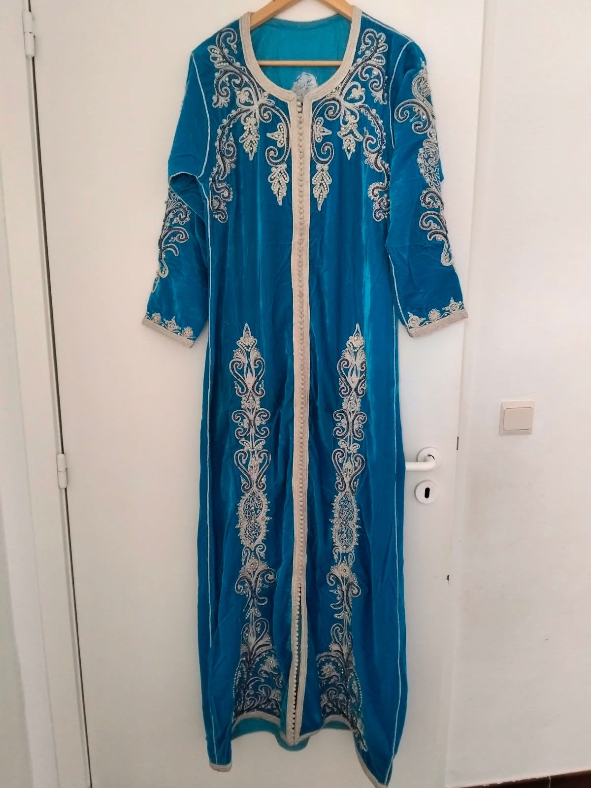 Kaftan, Enlèvement, Comme neuf