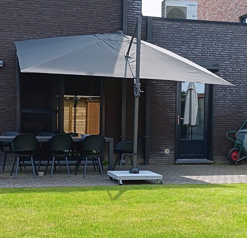 Grote parasol te koop., Ophalen