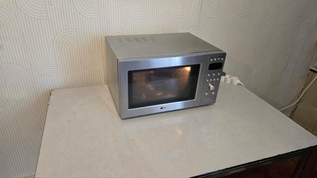 LG MC8083 roestvrijstalen magnetron in perfect werkende staa