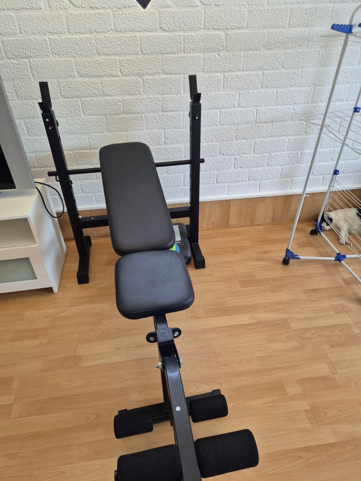 Halterbank met gewichten, Ophalen