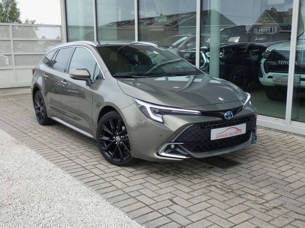 Toyota Corolla 1.8 Hybrid Premium 140pk +Head-up display +Sp, Auto's, 1300 kg, Gebruikt, 4 cilinders, Bruin