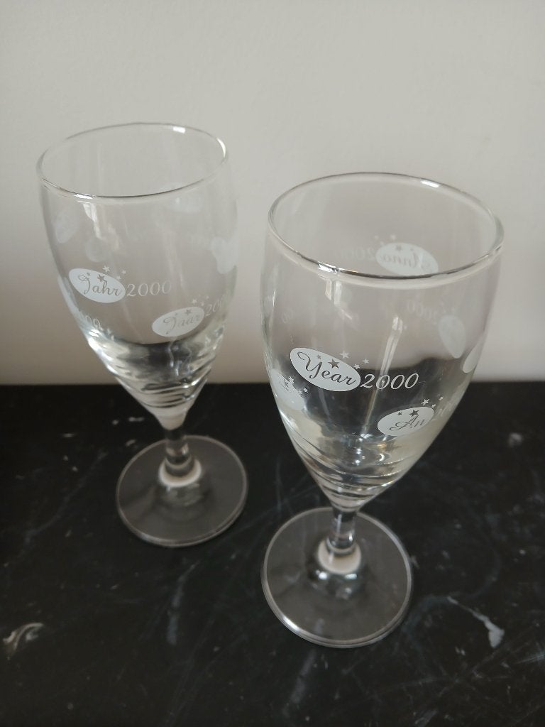 2 flûtes a champagne de  L' AN 2000, Enlèvement