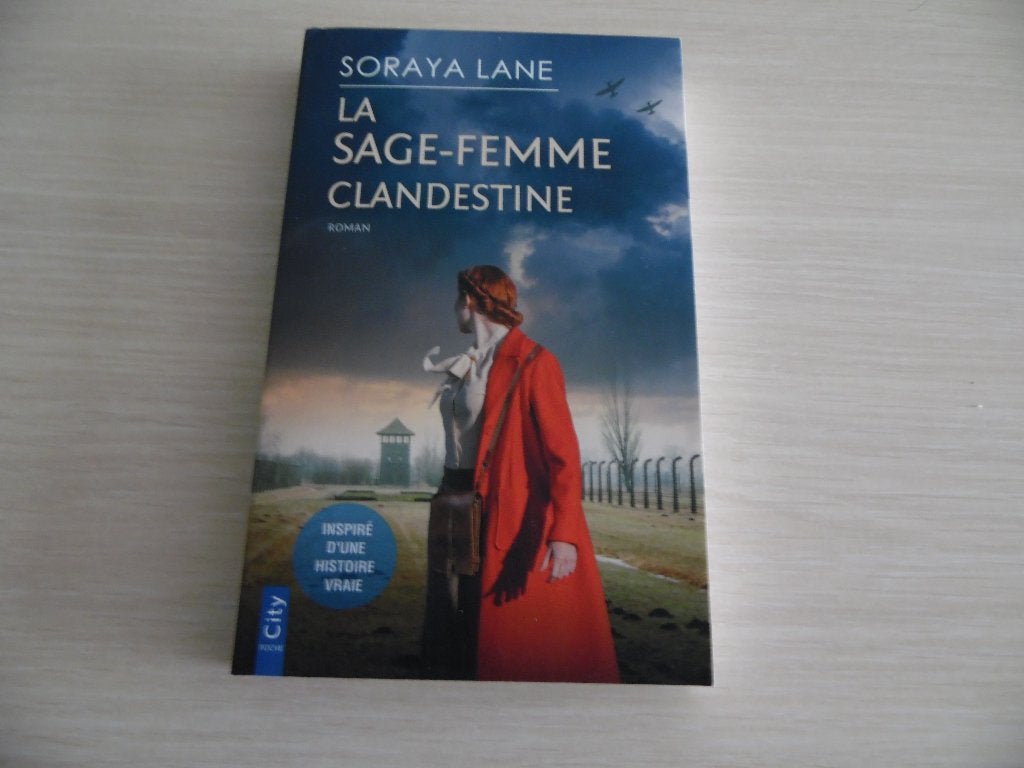 LA SAGE-FEMME CLANDESTINE       SORAYA LANE, Enlèvement ou Envoi, Comme neuf, Soraya Lane, Reste du monde