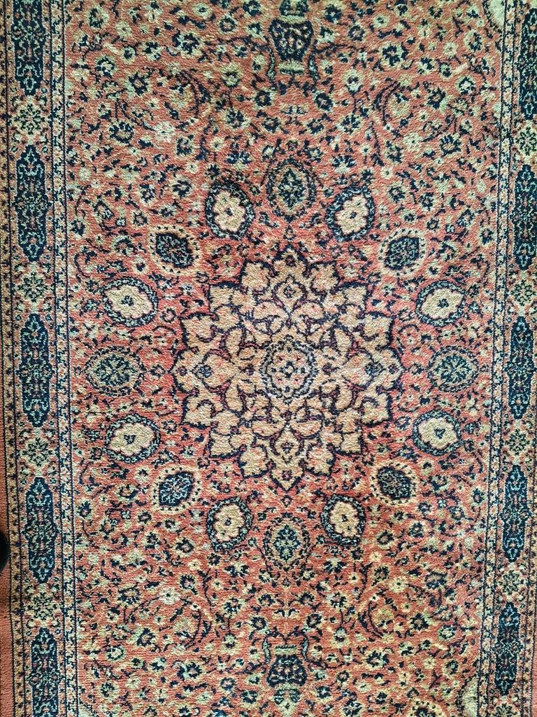 Loper tapijt, Ophalen