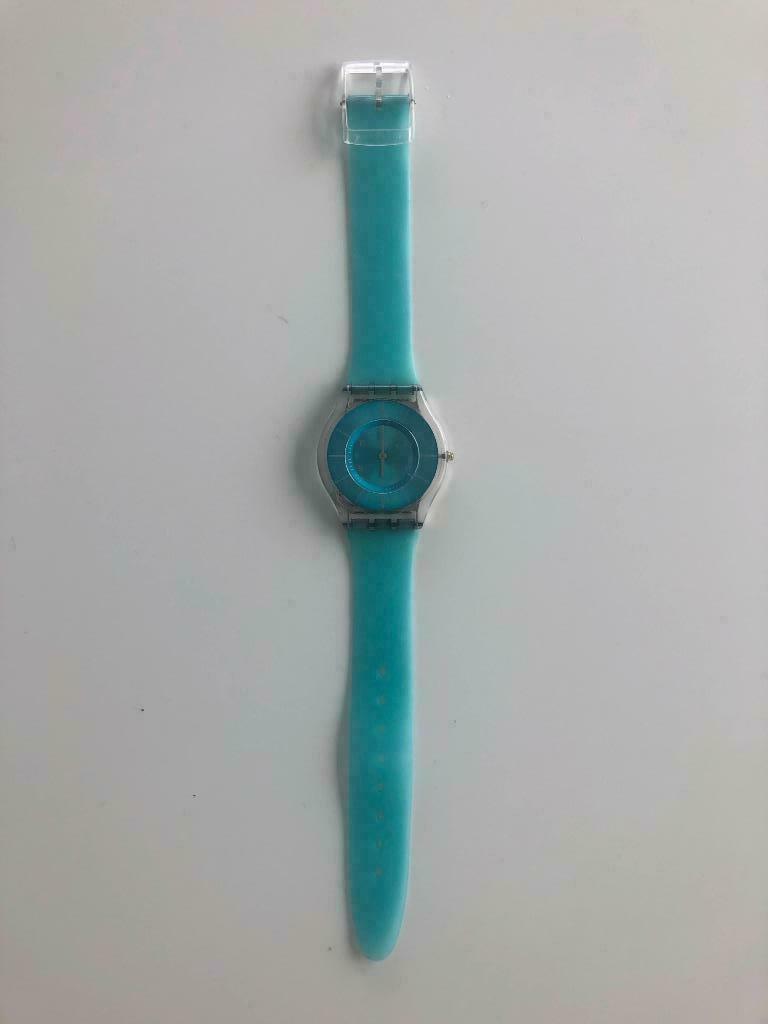 SWATCH licht blauw, Overige merken, Overige materialen, Polshorloge, Ophalen of Verzenden
