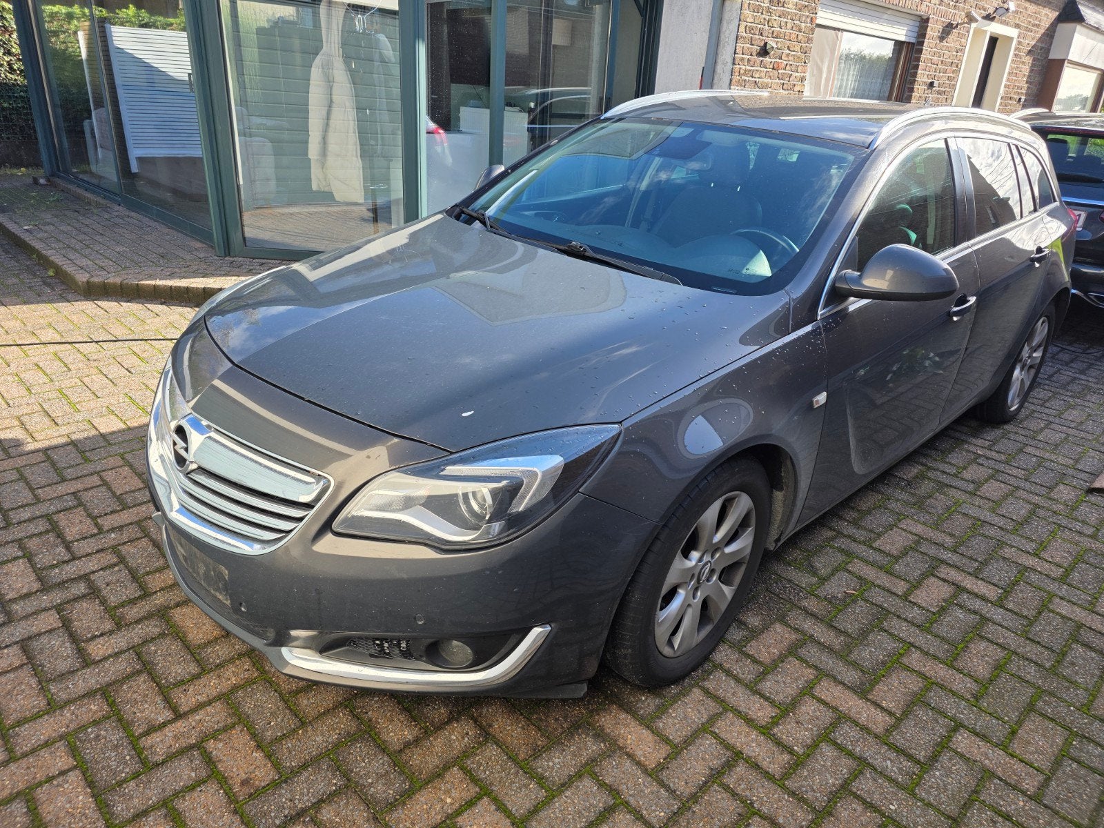 opel insigna sports oturur sw, Auto's, Euro 5, Achterwielaandrijving, Zwart, Leder en Stof