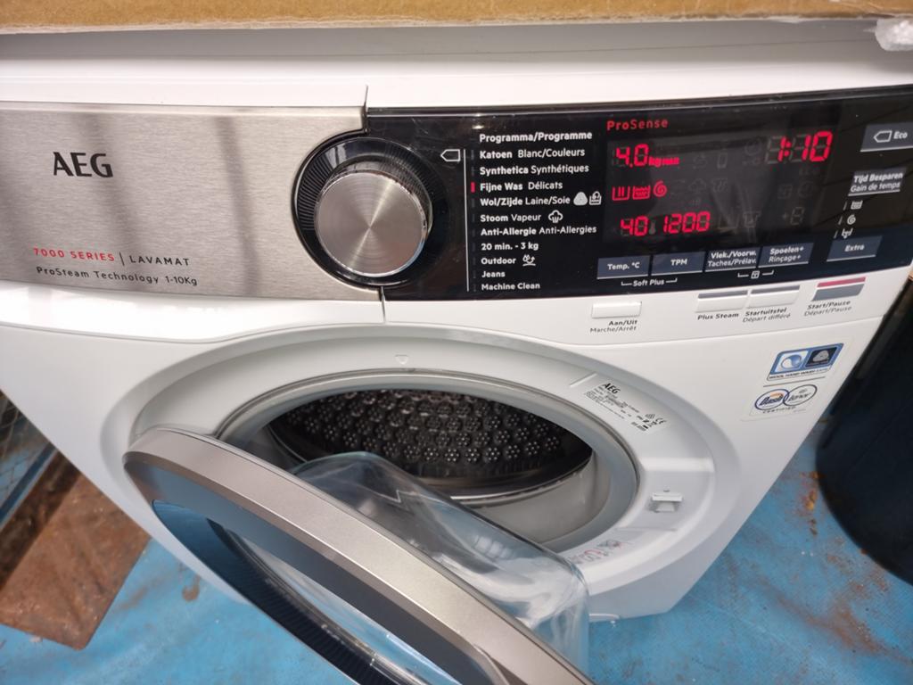 Wasmachine en droogkast Aeg, Ophalen