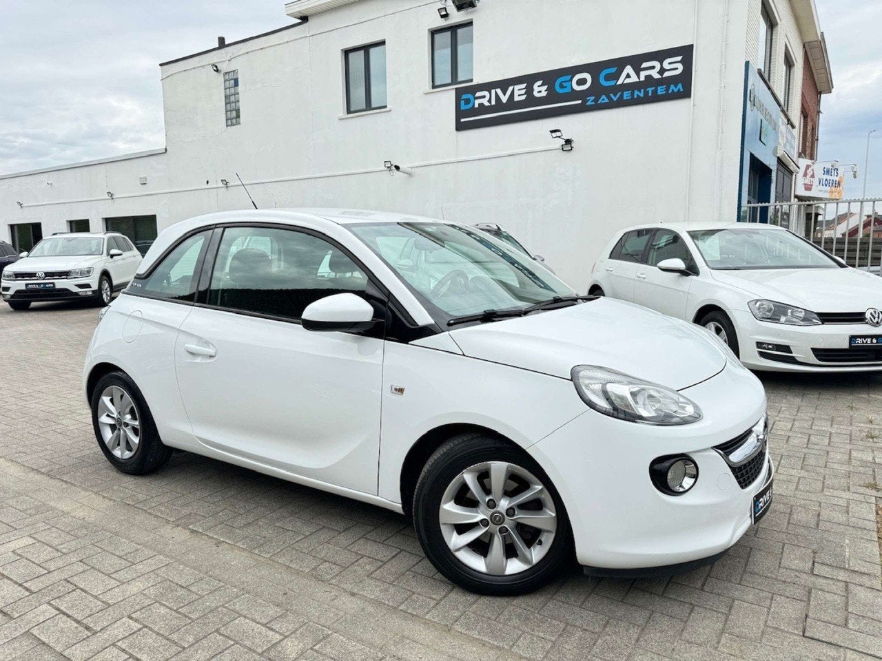 Opel ADAM 1.2i Benzine - Navigatie * 1 JAAR GARANTIE *, Auto's, Voorwielaandrijving, 4 zetels, Gebruikt, 4 cilinders