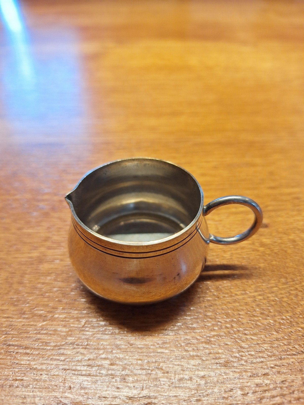 Verzilverd melkkannetje, Ophalen, Zilver
