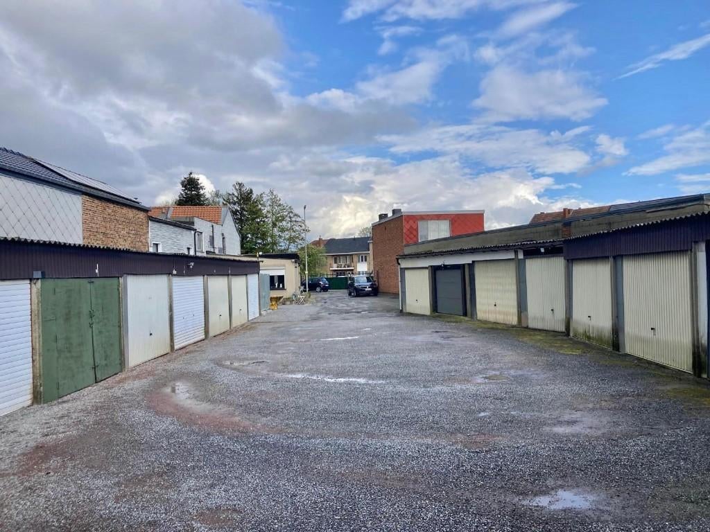 Te koop: 2 woningen met 16 garageboxen, 9a87ca te Tongeren, Immo, Maisons à vendre, Province de Limbourg, 500 à 1000 m²