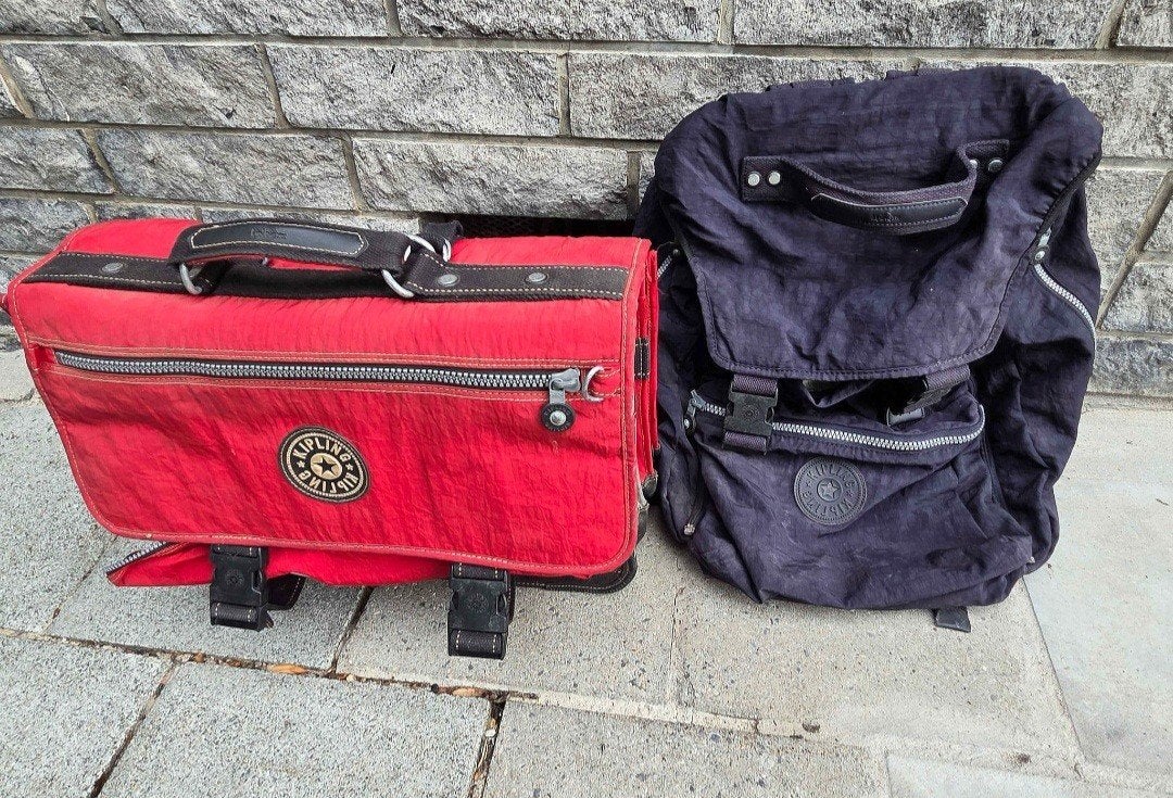 2 kipling boekentassen, Ophalen