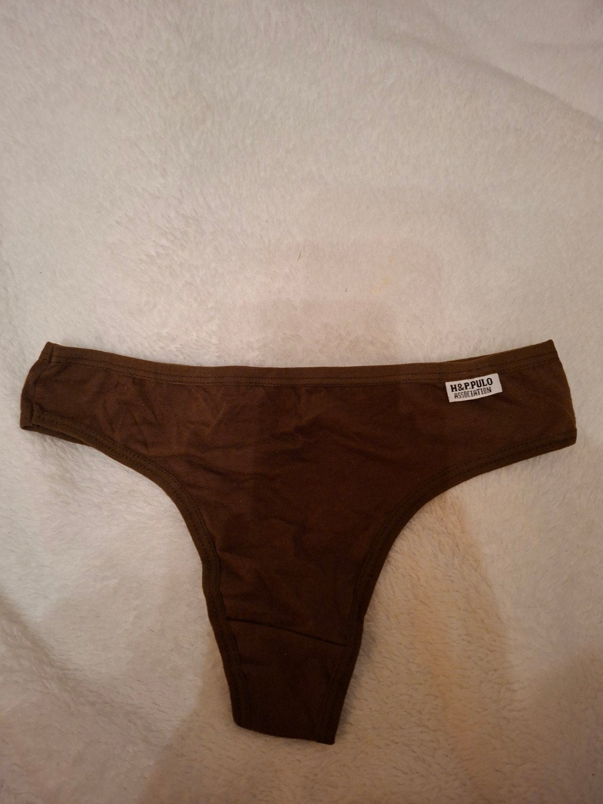 Bruine string, Verzenden, String