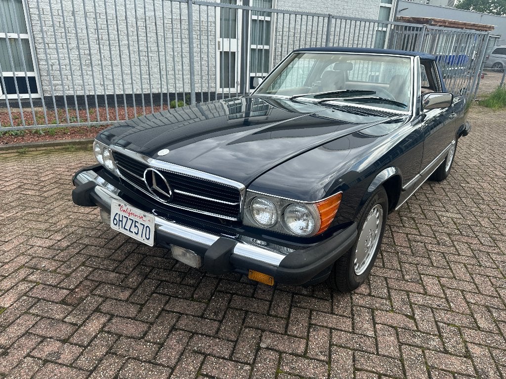 Mercedes-Benz SL-Klasse560 SL, Auto's, Automaat, Achterwielaandrijving, Cabriolet, Blauw